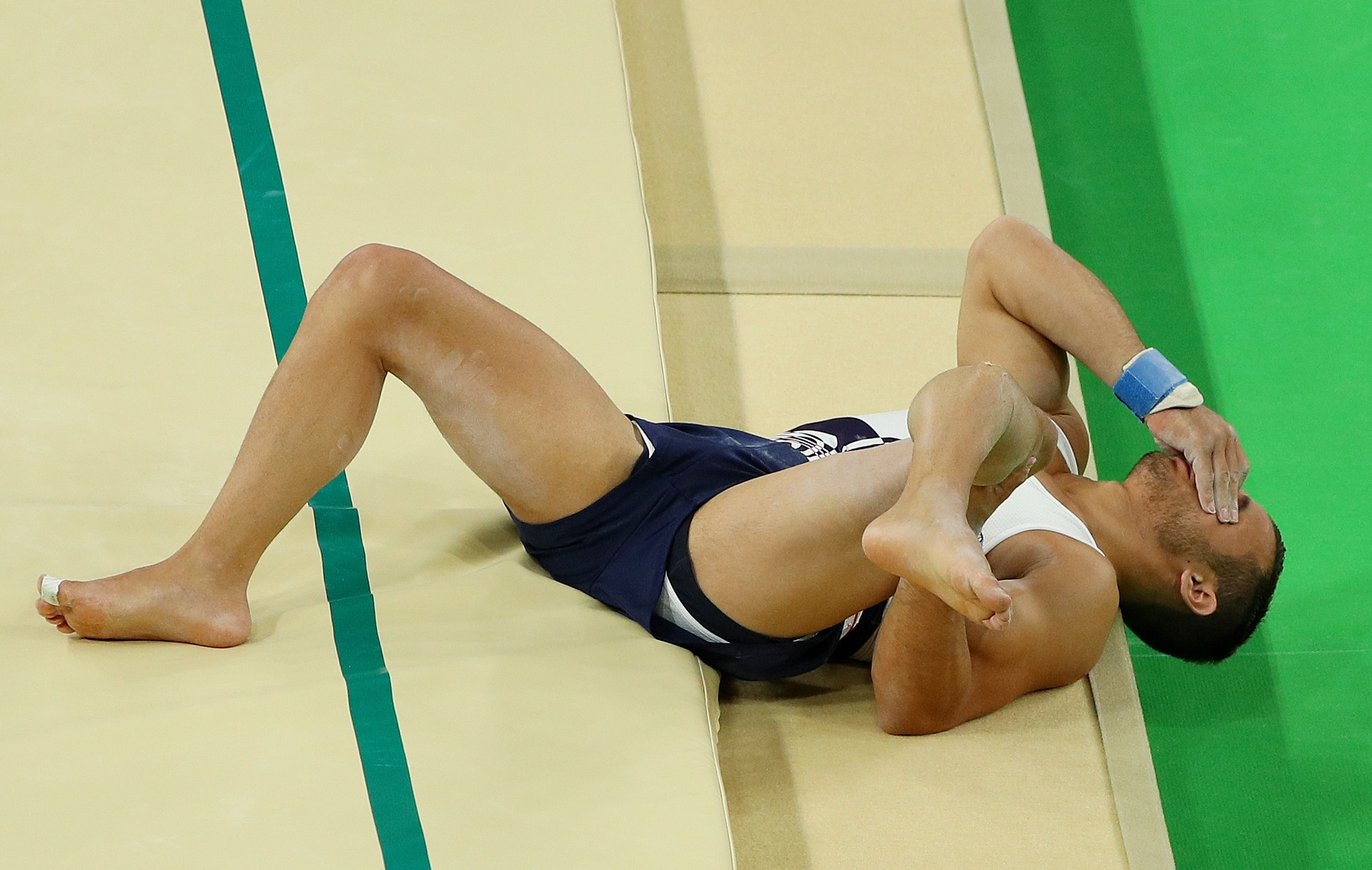 RIO DE JANEIRO, BRAZIL - AUGUST 06:  Samir Ait Said of France breaks his leg while competing on the vault during the Artistic Gymnastics Men's Team qualification on Day 1 of the Rio 2016 Olympic Games at Rio Olympic Arena on August 6, 2016 in Rio de Janeiro, Brazil.  (Photo by Scott Halleran/Getty Images)