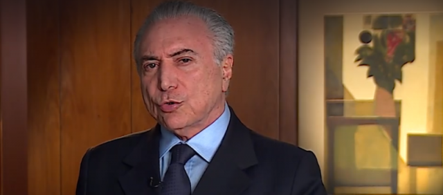 “Sabemos que tem gente que quer parar o Brasil”, provoca Temer em vídeo oficial