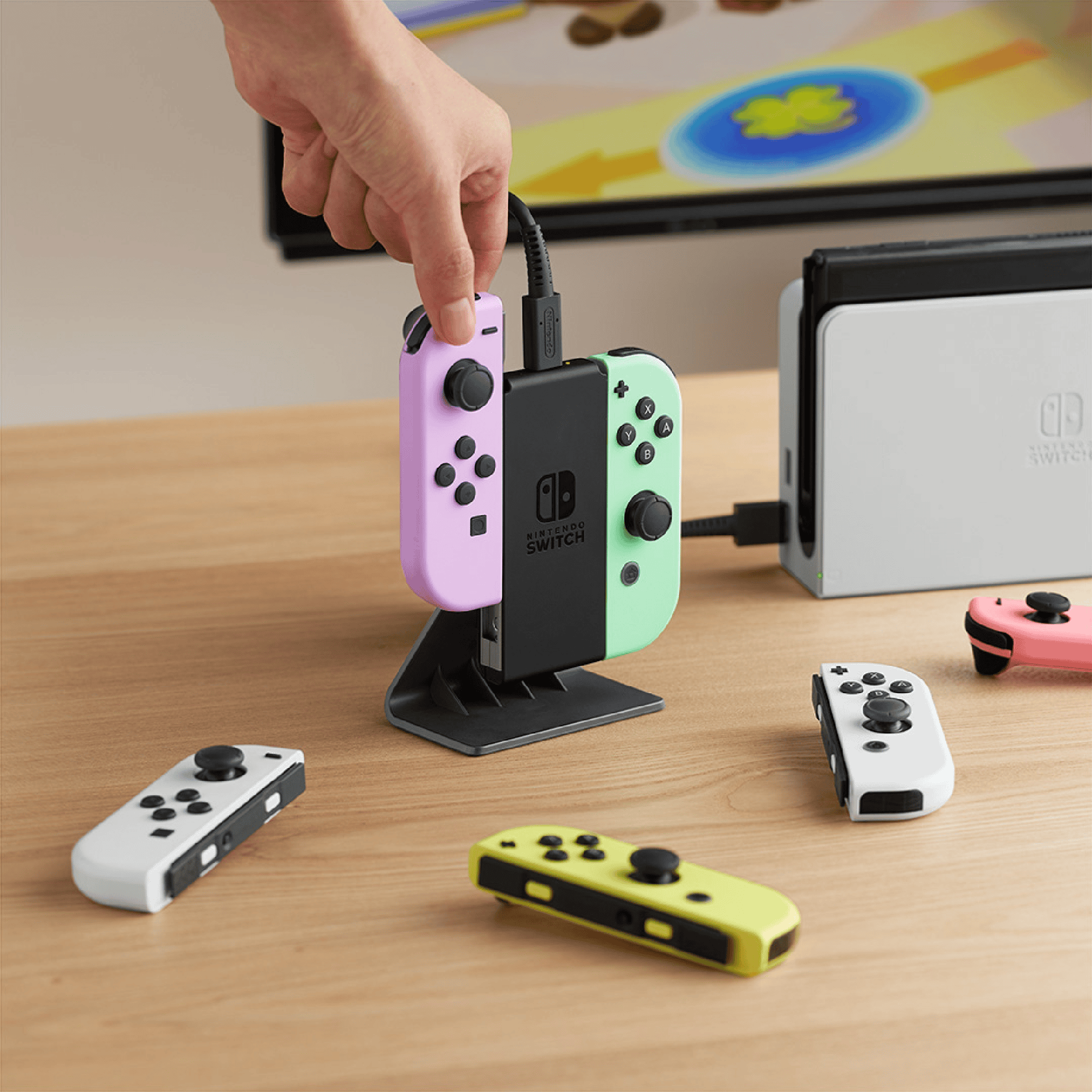 Imagem mostra um novo carregador portátil para os controles do Nintendo Switch